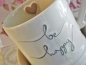 Bastion Collections Tasse be happy in Grau